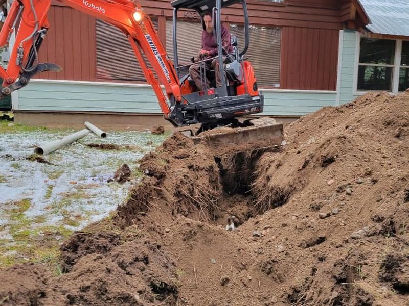 Excavator working a site in La Plata County