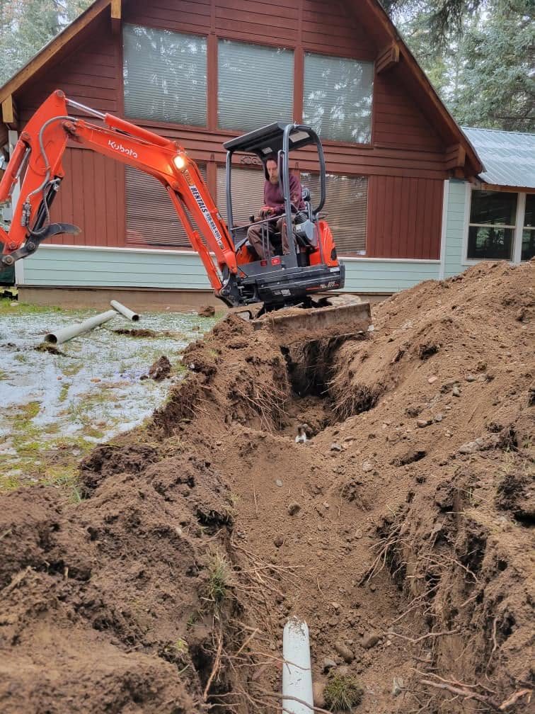 Excavator working a site in La Plata County