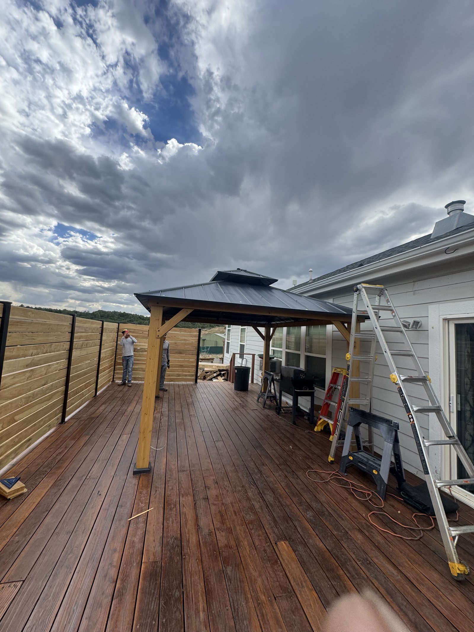 Finished timber pergola covering an outdoor patio space