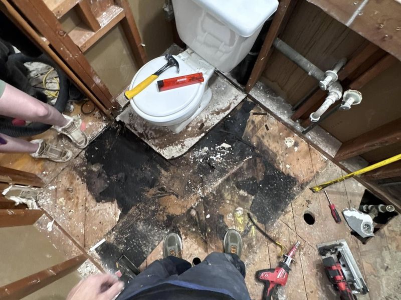 Bathroom demolition, taken down to the studs and subfloor