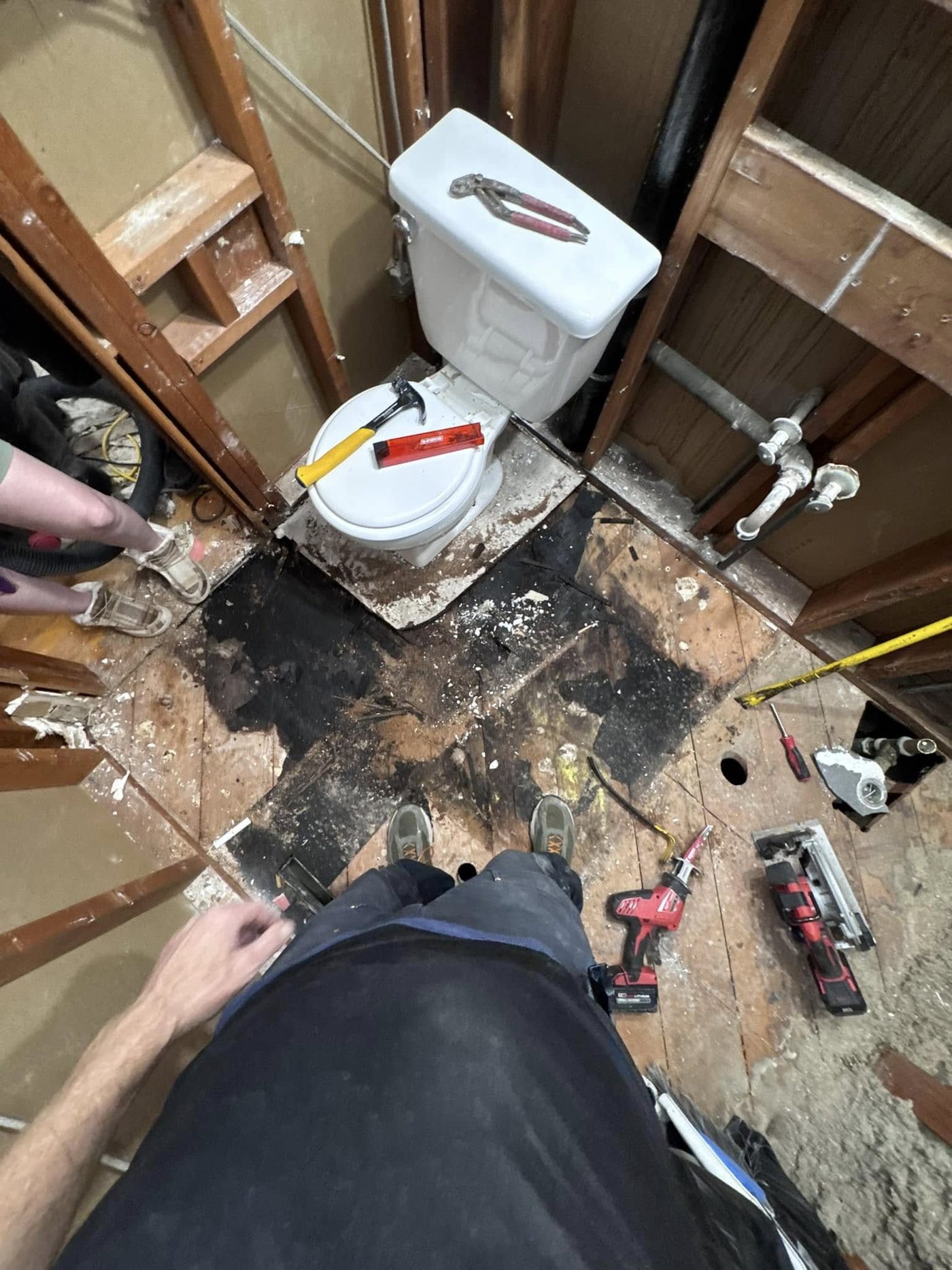Bathroom demolition, taken down to the studs and subfloor