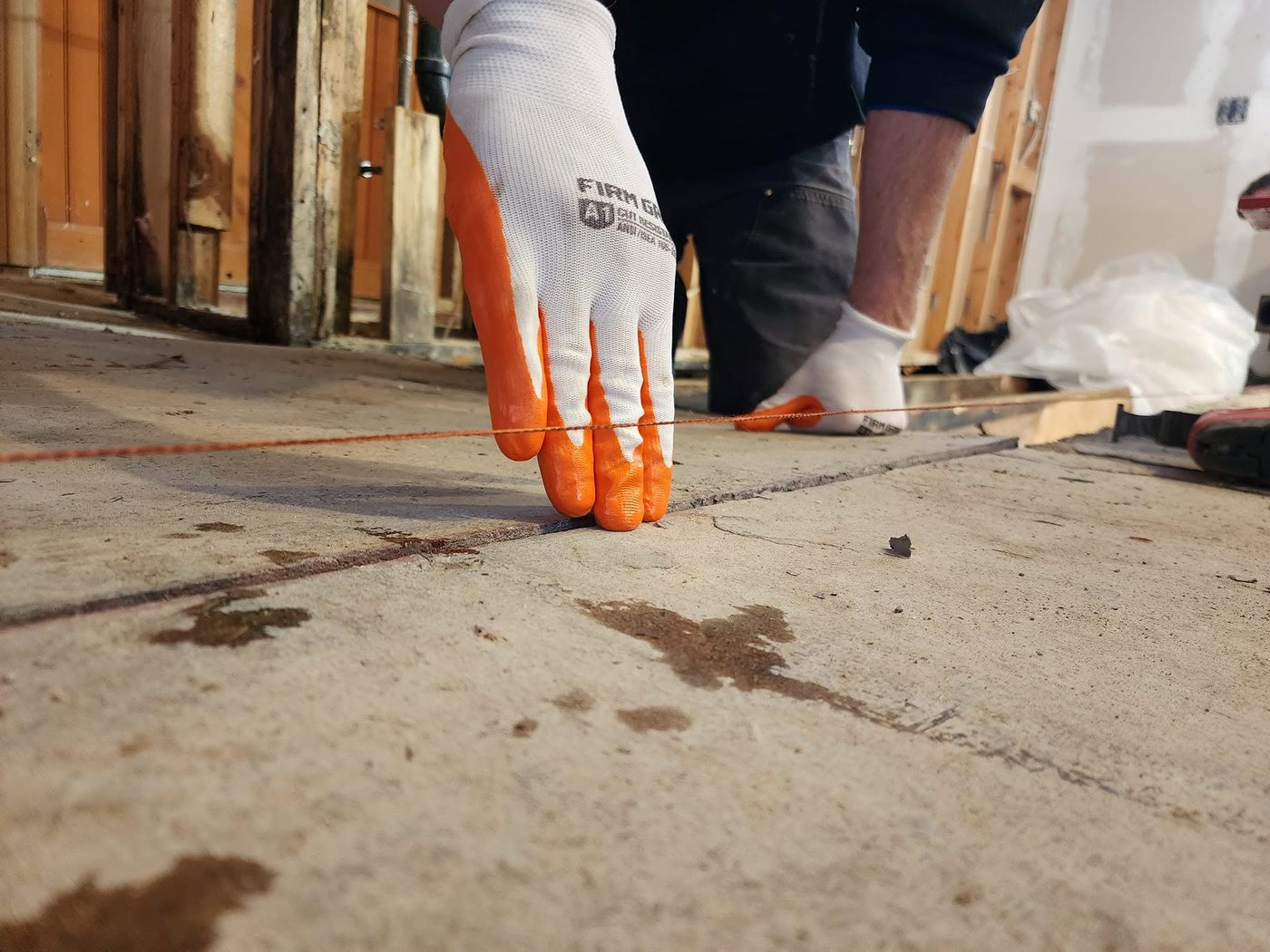 Interior showing an unlevel floor before structural correction